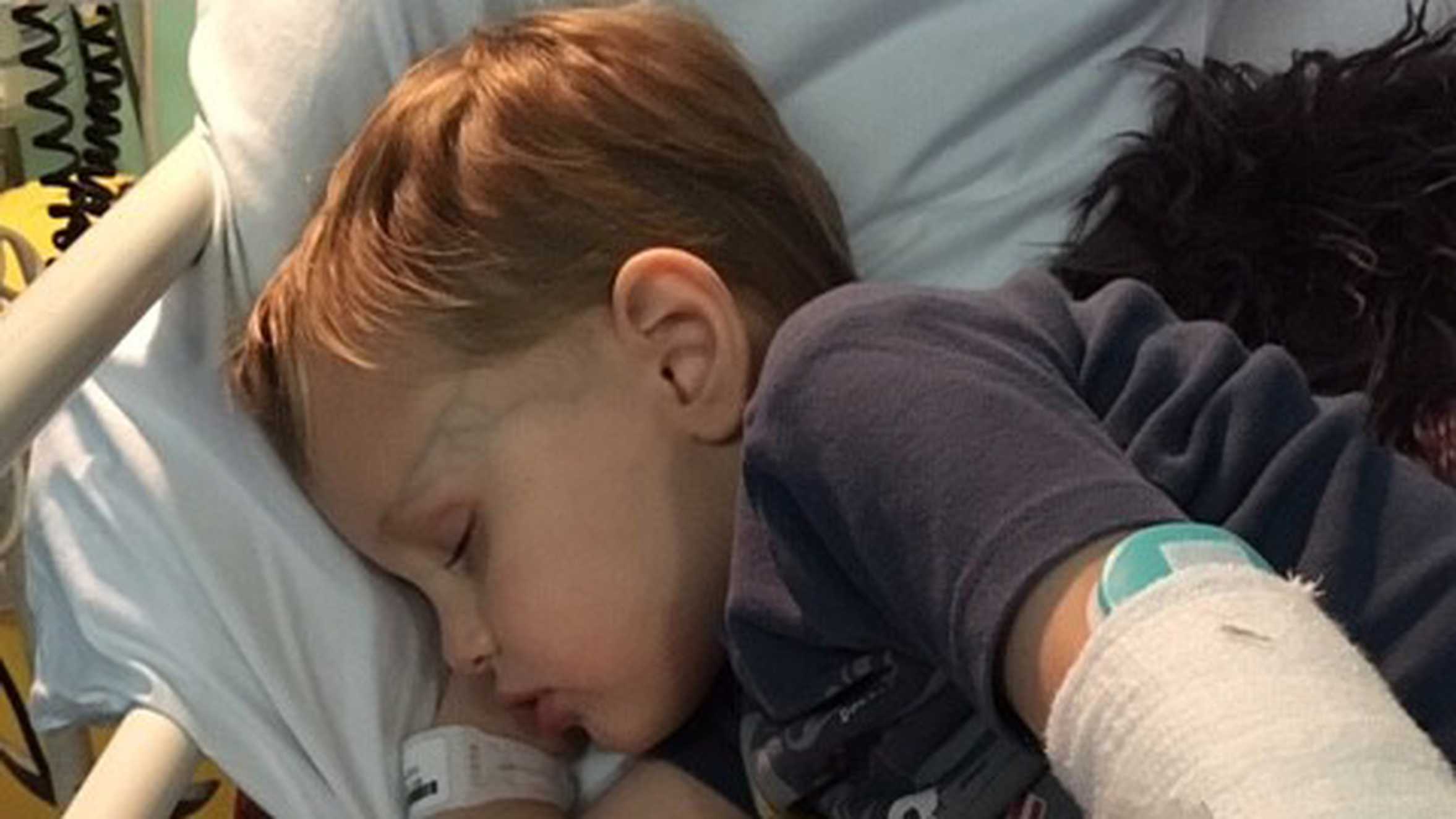 Finn asleep in his hospital bed