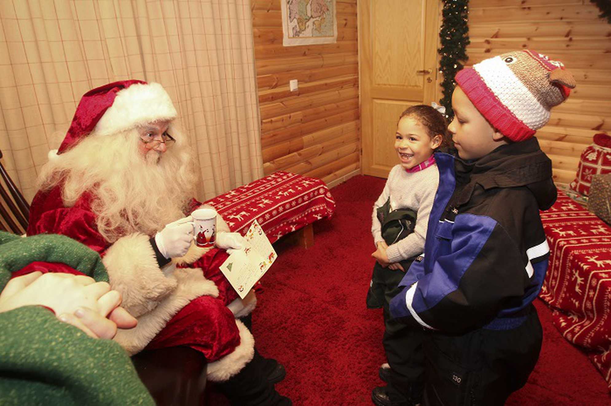 Alyssa meeting Father Christmas in Lapland.