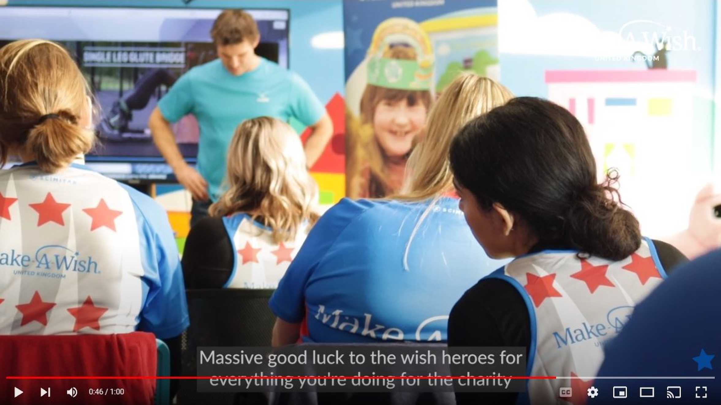 Trainer, Graeme Hildich speaking to a group of Make-A-Wish supporters at the charity's Reading hub, ahead of the 2023 London Marathon.